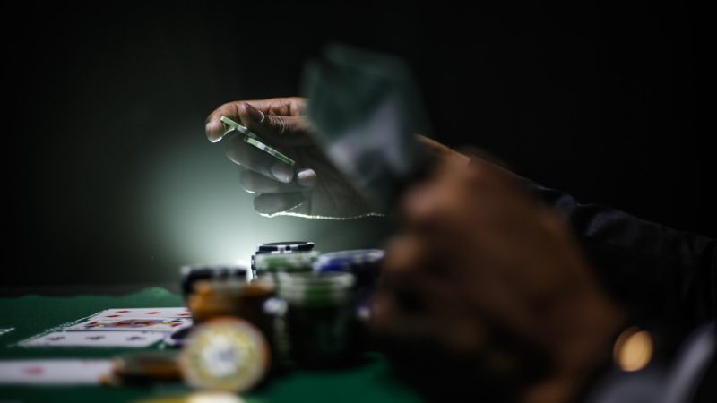 selective focus photography of poker chips